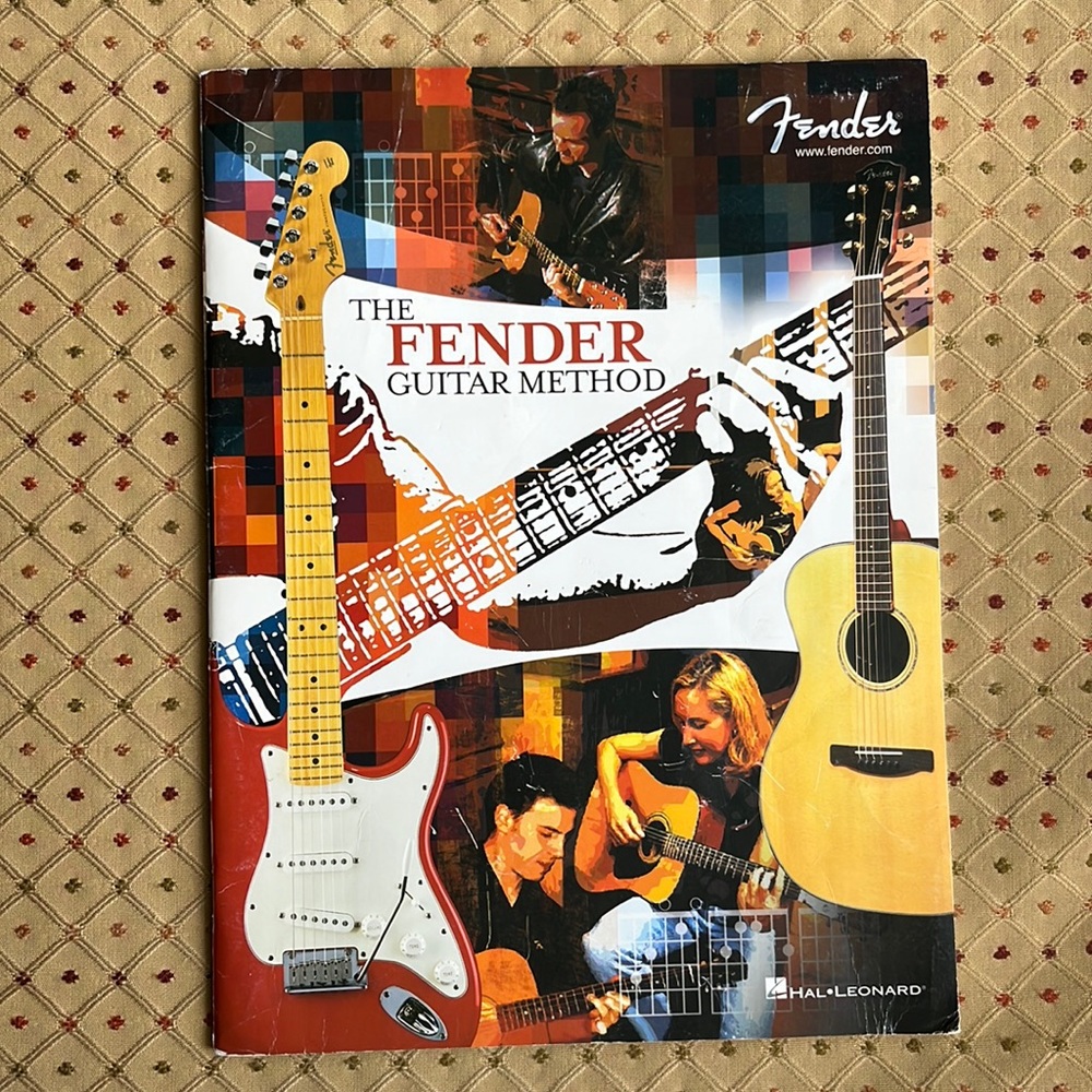 The Fender Guitar Method beginning music book.
